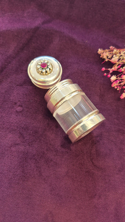 Kumkum, karpura box or multi utility silver box with red cut stone work.