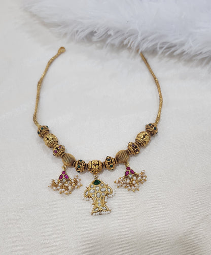 Nagas balls and kundan necklace