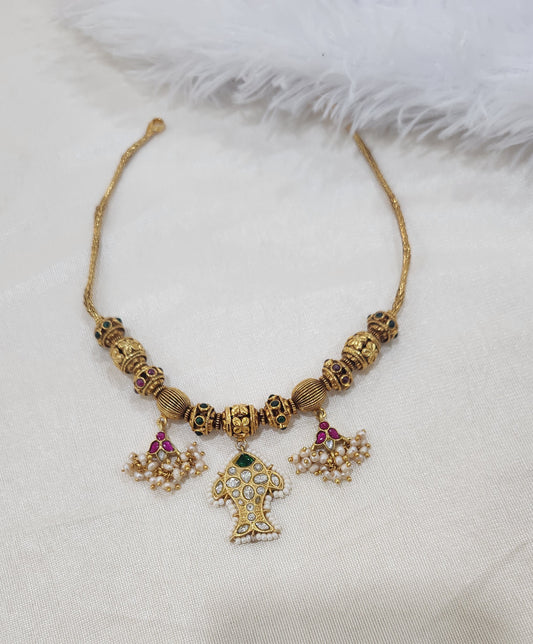 Nagas balls and kundan necklace