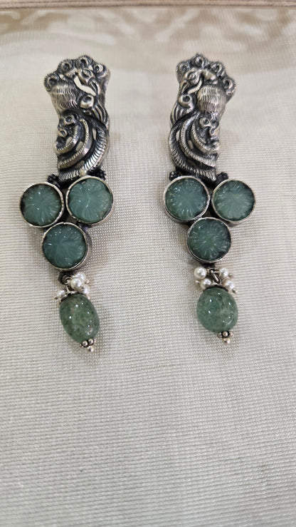 Peacock motifs silver studs