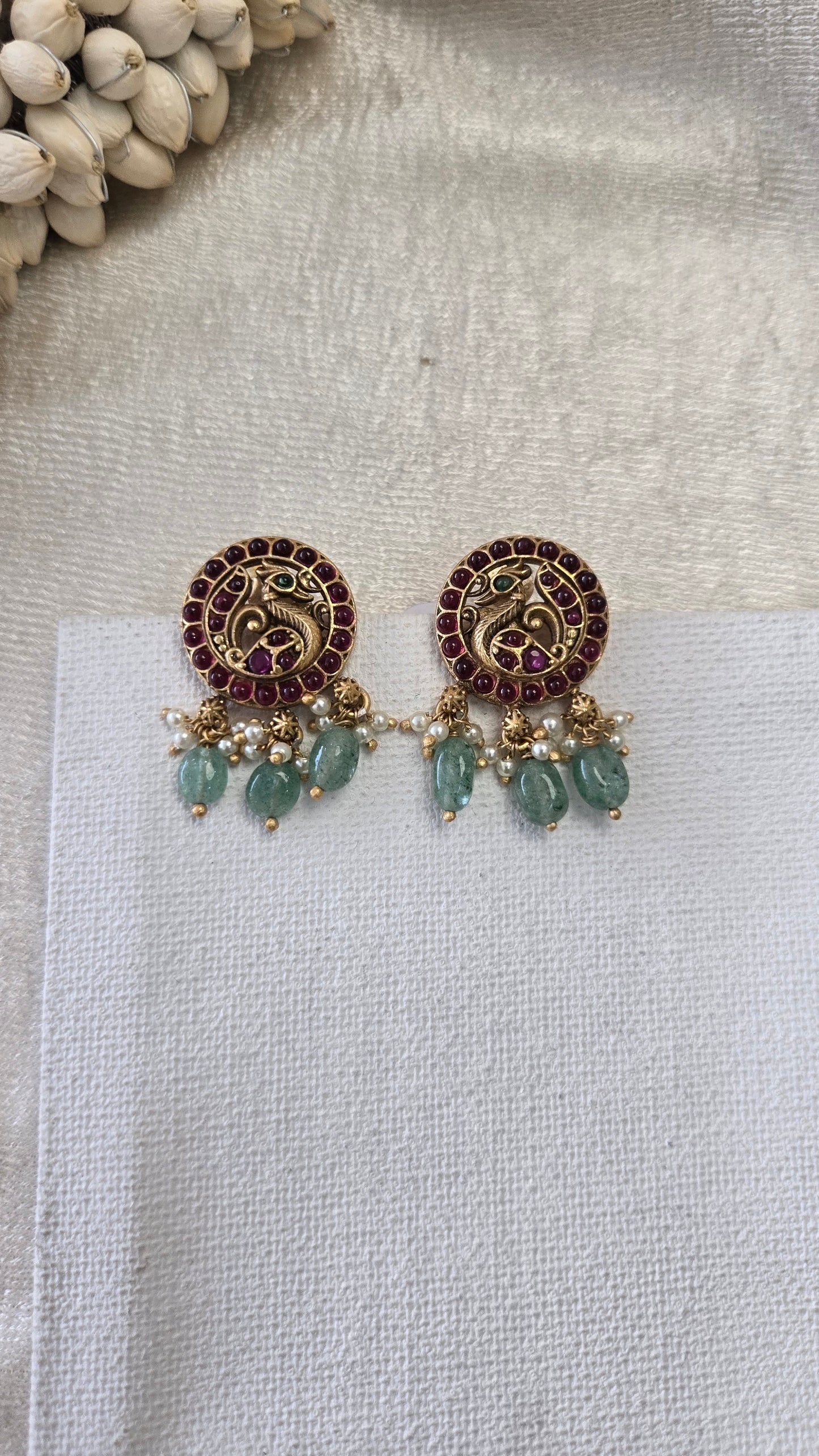 Peacock kundan earrings with green bead drops