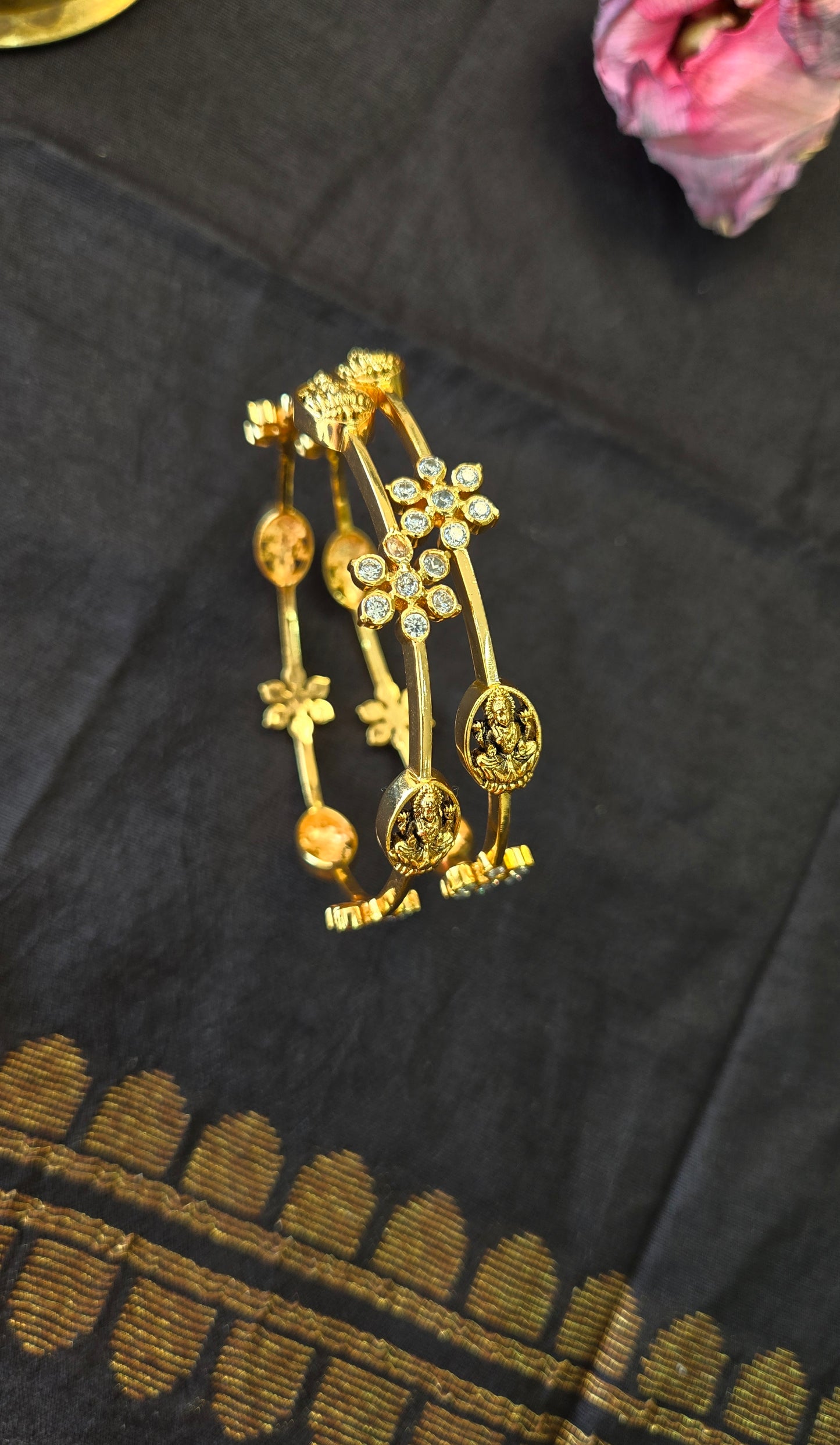 Laxmi Nagas bangle with closed setting