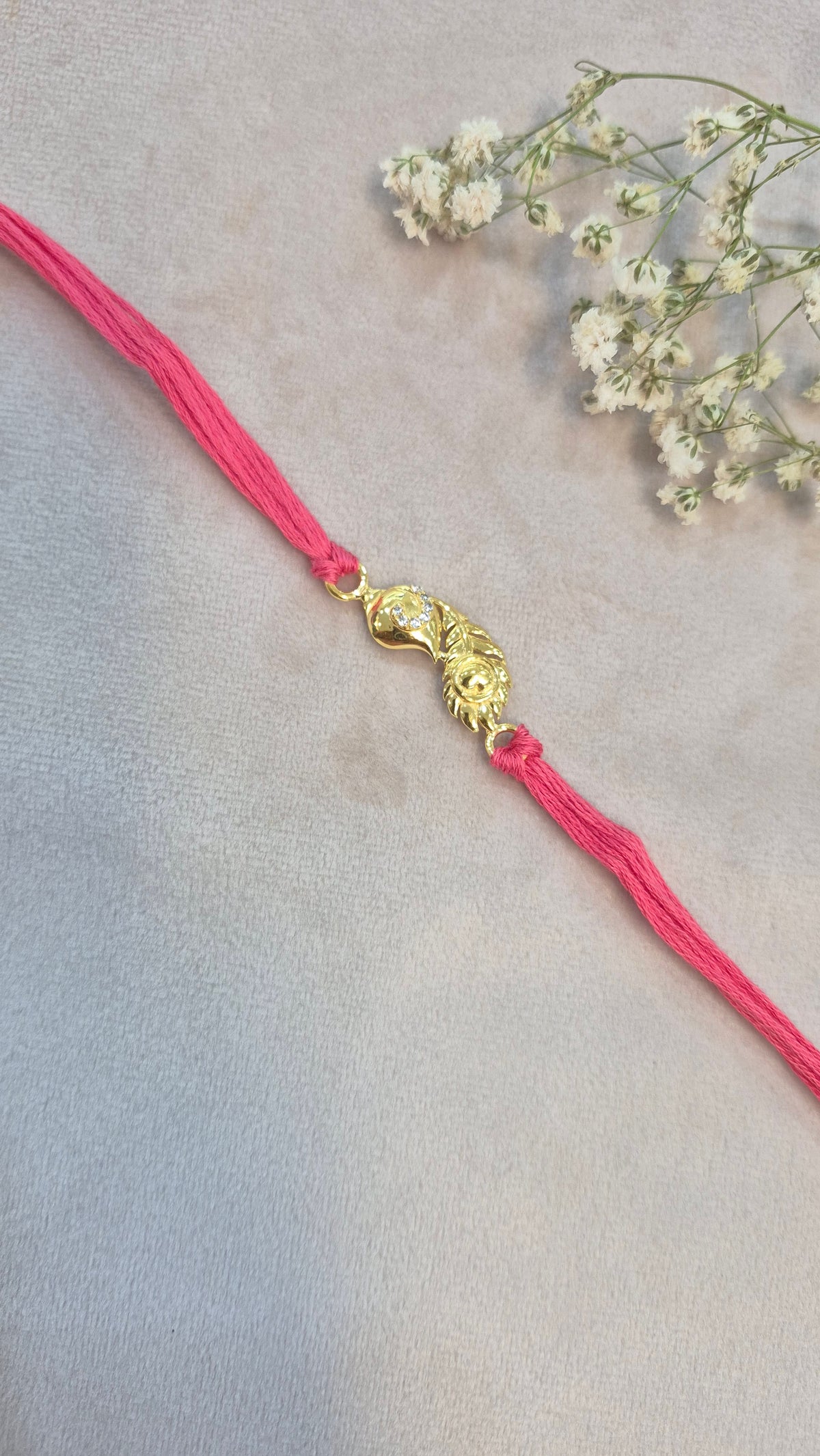 Peacock feather Rakhi