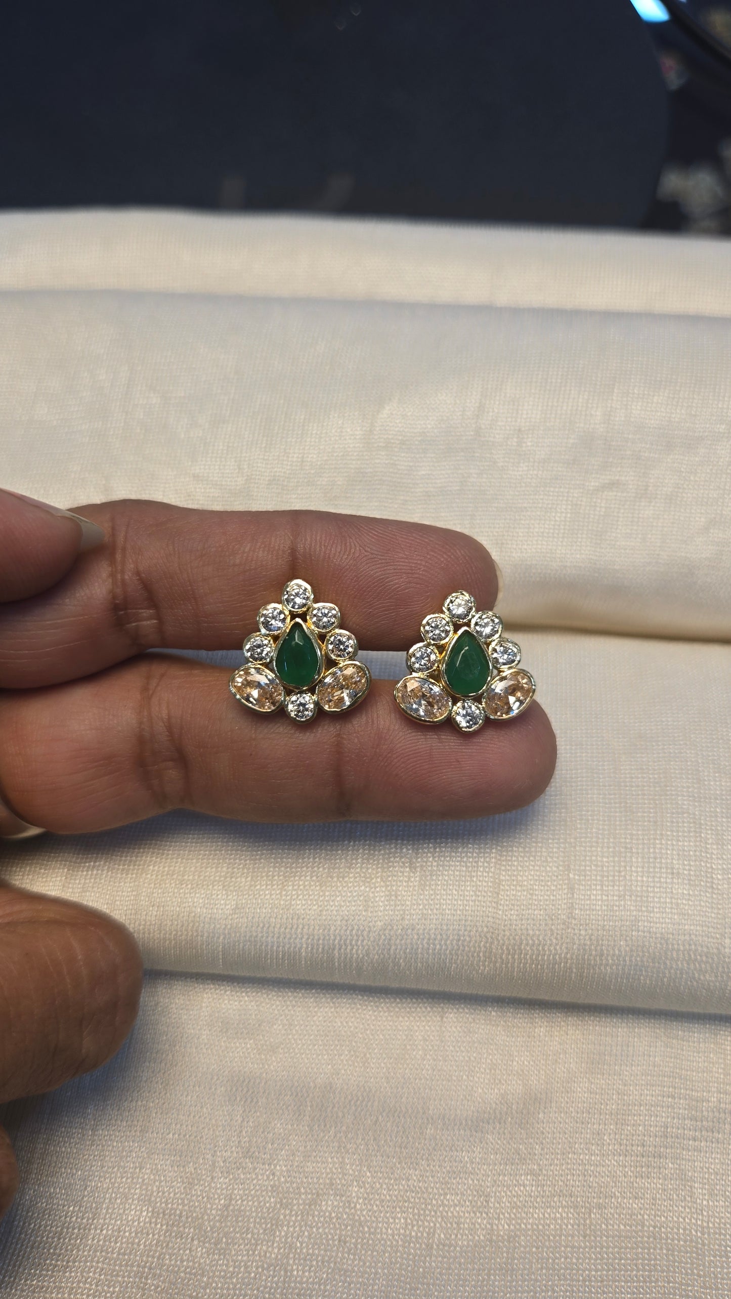 Polki with green semi precious stone studs