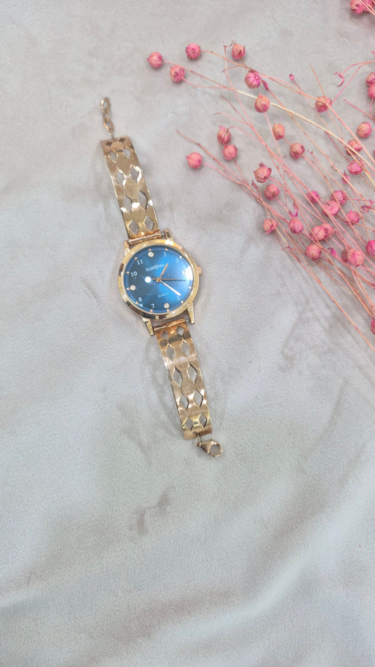 Rose gold watch with blue dail