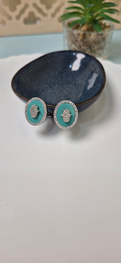 Hamsa stud on blue stone with zircon stones