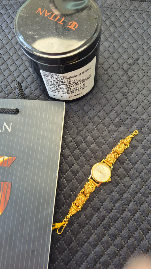 Original Titan watch with silver nakshi peacock strap