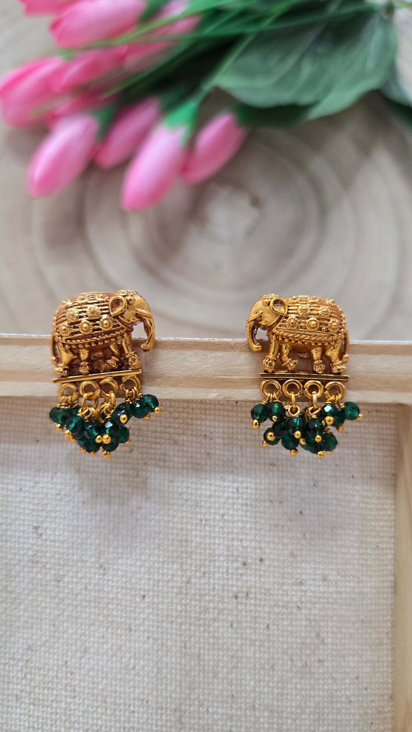 Green elephant earring