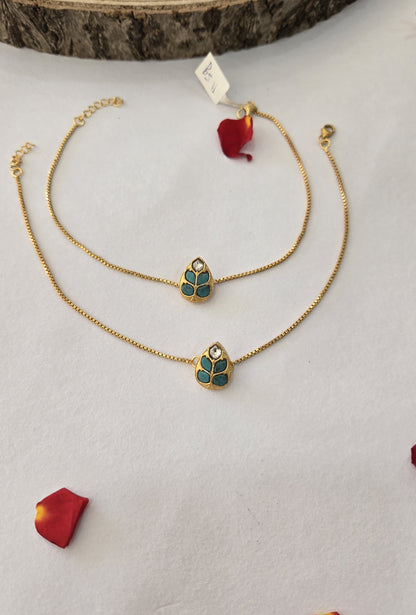 92.5 silver with 24k gold polish Kundan Anklets with turquoise leaf motifs