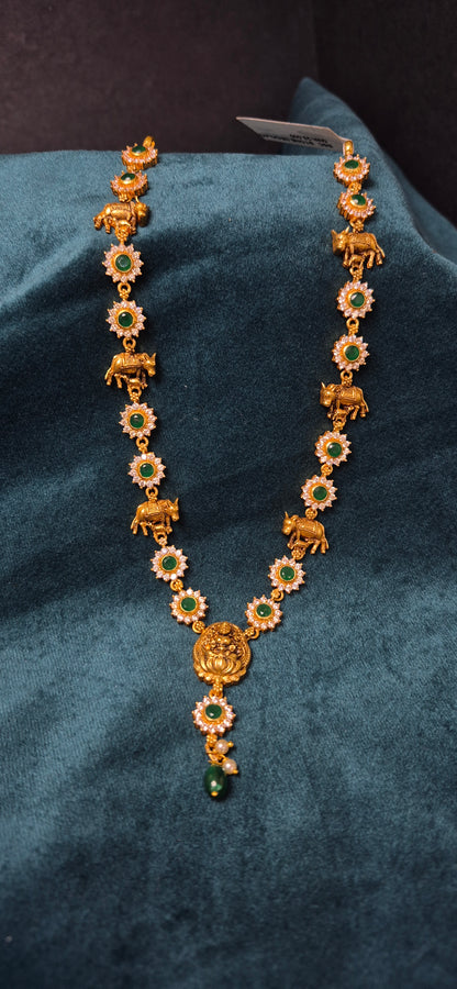 Stone necklace with cow and calf detailing