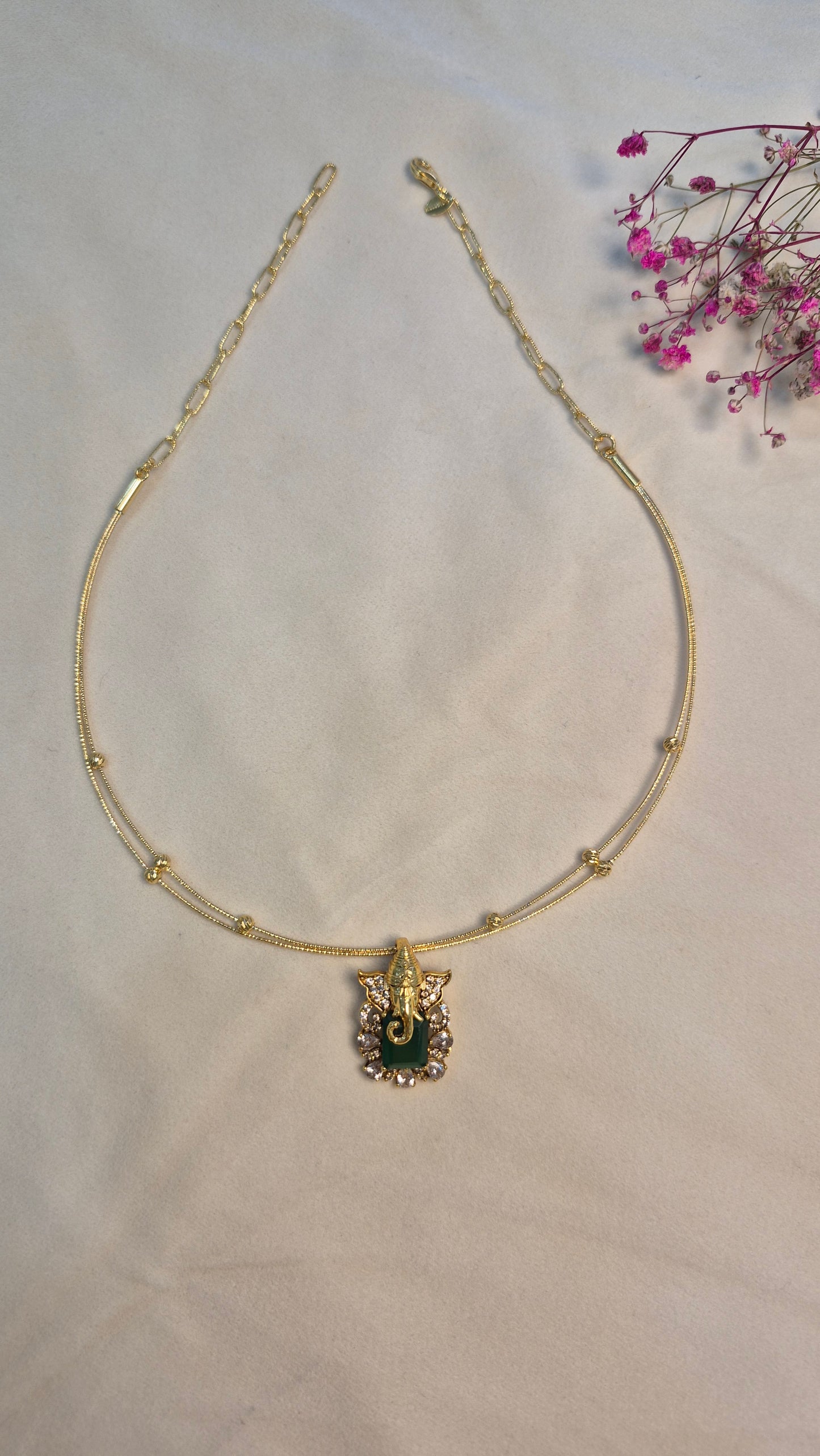 Ganesha green pendant with 2 line gold ball hasli