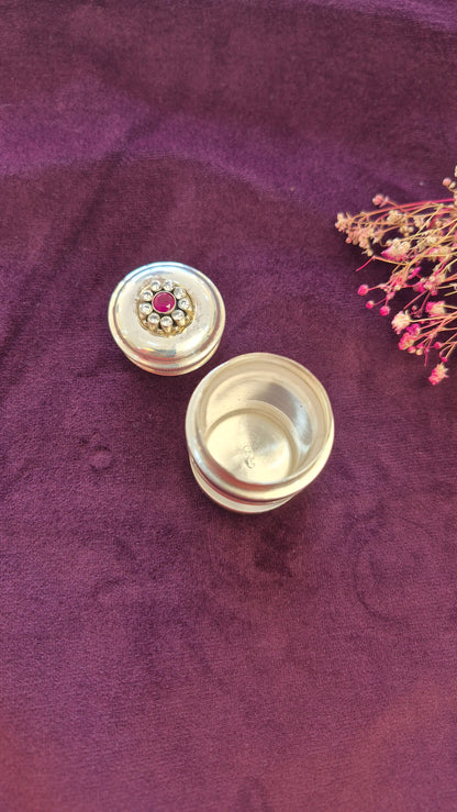 Kumkum, karpura box or multi utility silver box with red cut stone work.