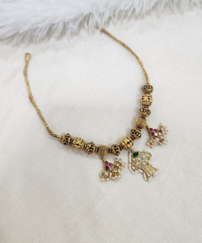 Nagas balls and kundan necklace