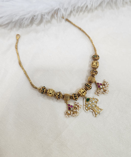 Nagas balls and kundan necklace